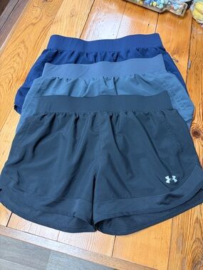 3 pairs Under Armour Women's Black Blue and Gray Performance Running Shorts